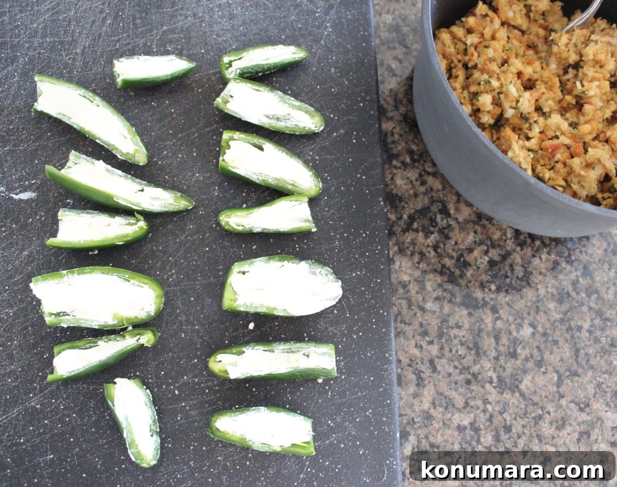 Assembling Cream Cheese Stuffing Jalapeno Poppers