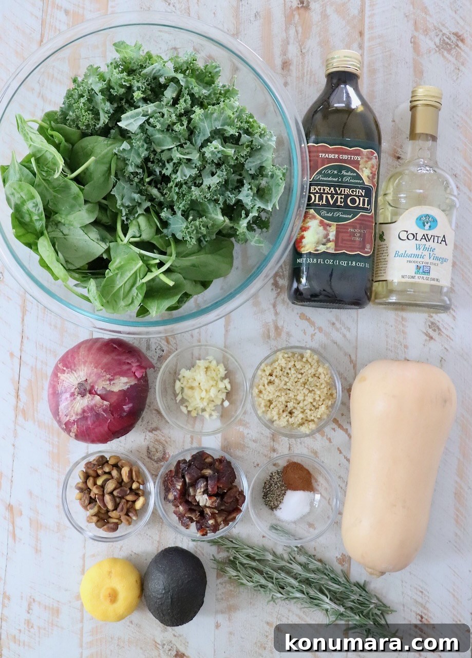 Roasted Butternut Squash Salad with Maple Vinaigrette 3 butternut squash salad ingredients laid out on a white wood board