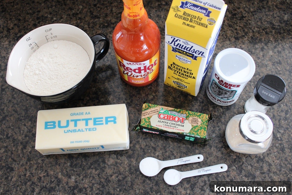Buffalo Cheddar Biscuits Recipe 3 Buffalo Cheddar Biscuit Recipe Ingredients on a granite countertop