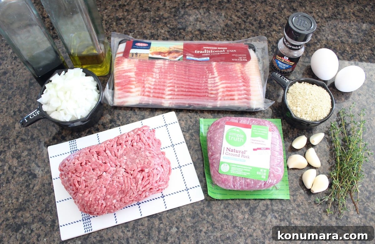 Juicy Bacon-Wrapped Meatloaf Recipe 3 Bacon Wrapped Meatloaf Ingredients displayed on countertop