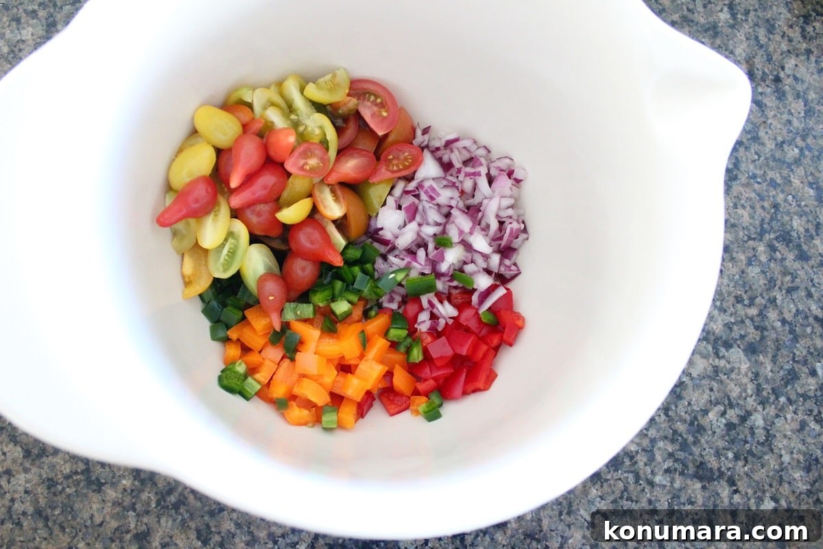 Israeli Couscous and Avocado Salad with Lemon Vinaigrette 4 diced vegetables in large bowl