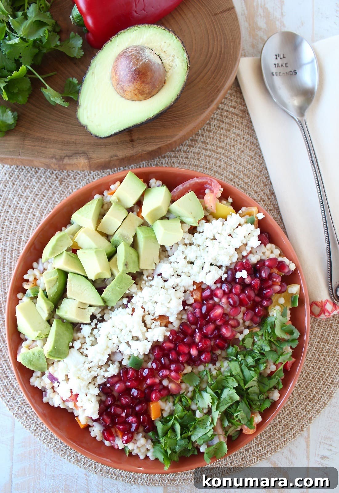 Israeli Couscous and Avocado Salad with Lemon Vinaigrette 5 Couscous Avocado Salad in orange bowl