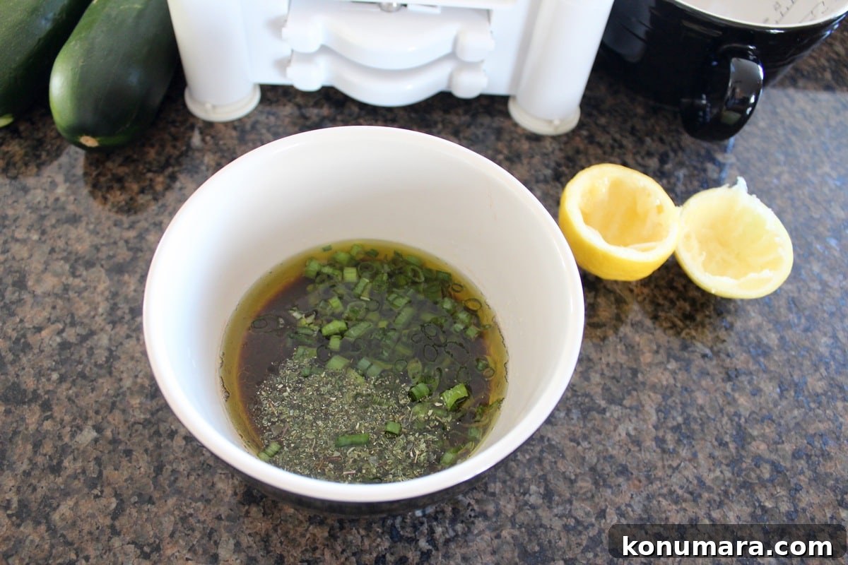 Greek Zucchini Noodles with Feta and Olives 4 Greek balsamic salad dressing in a small bowl