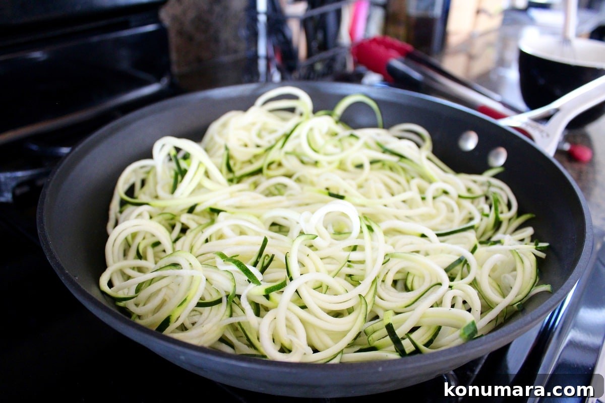 Greek Zucchini Noodles with Feta and Olives 5 zucchini noodles in a large skillet