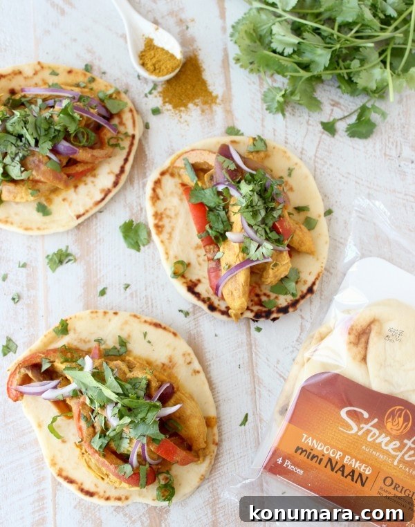 Indian Tacos on Naan Bread with Curry Chicken and Fresh Cilantro