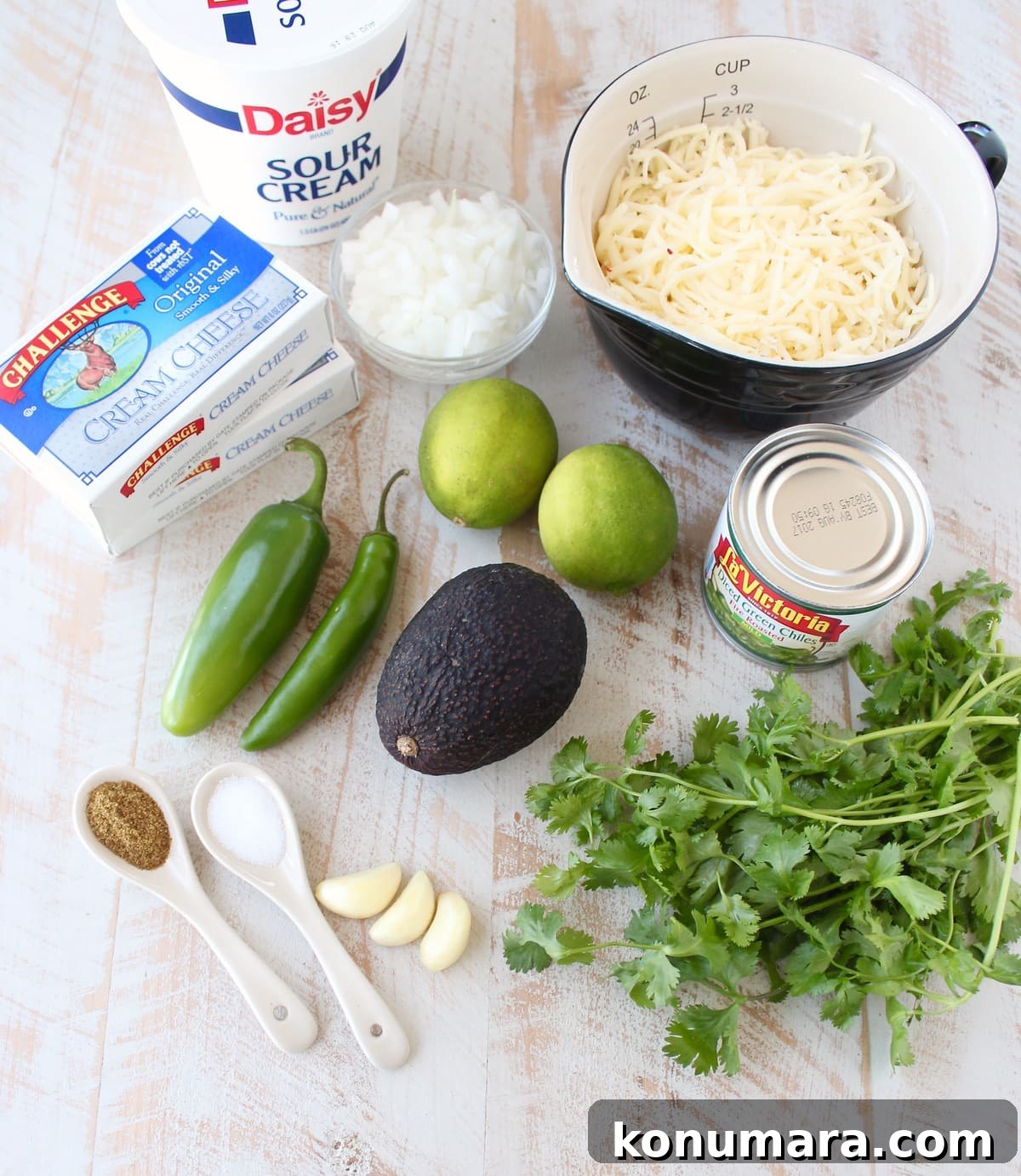 Queso blanco ingredients on white wood board