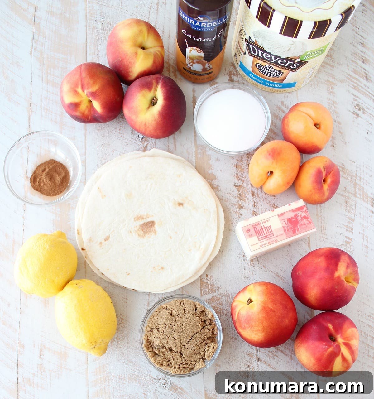 Crock Pot Dessert Fruit Taco Cups Ingredients on a white wood board