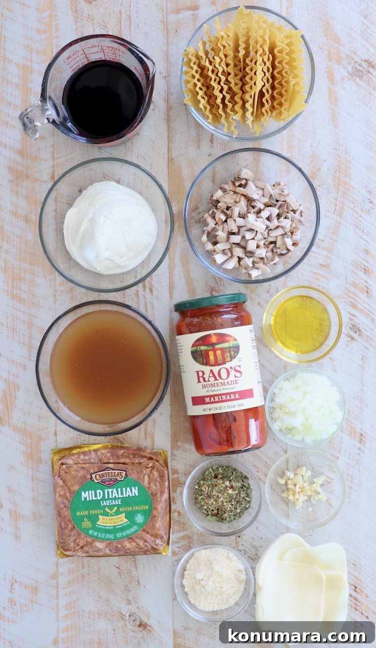 ingredients for skillet lasagna on white wood background