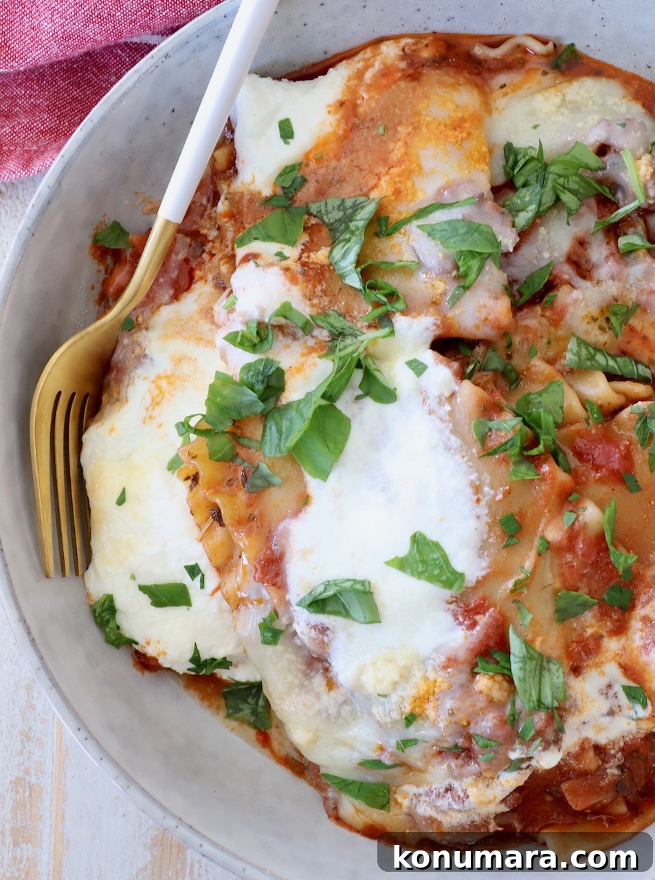 skillet lasagna served in a bowl with a fork
