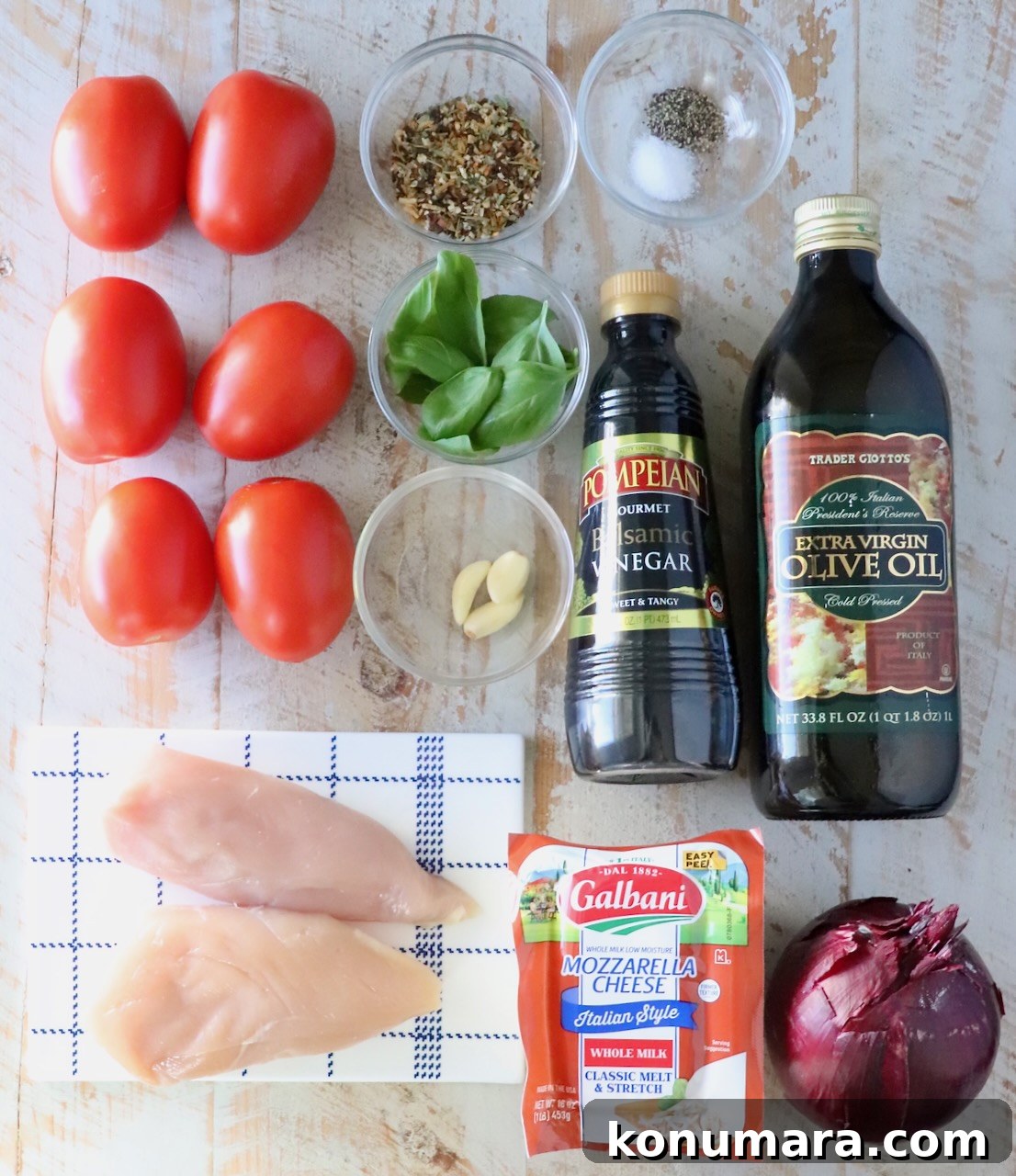 Bruschetta Chicken Recipe with Basil and Balsamic Glaze 3 ingredients for bruschetta chicken on a white wood board