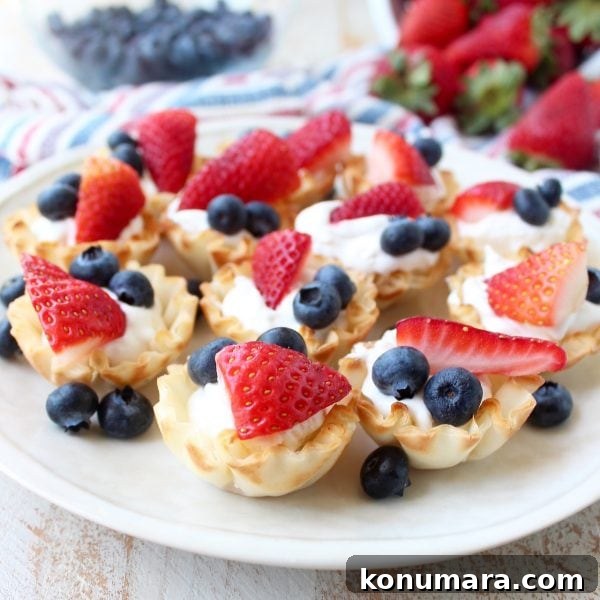 Close up of a berry cream fillo basket showing texture and fresh fruit