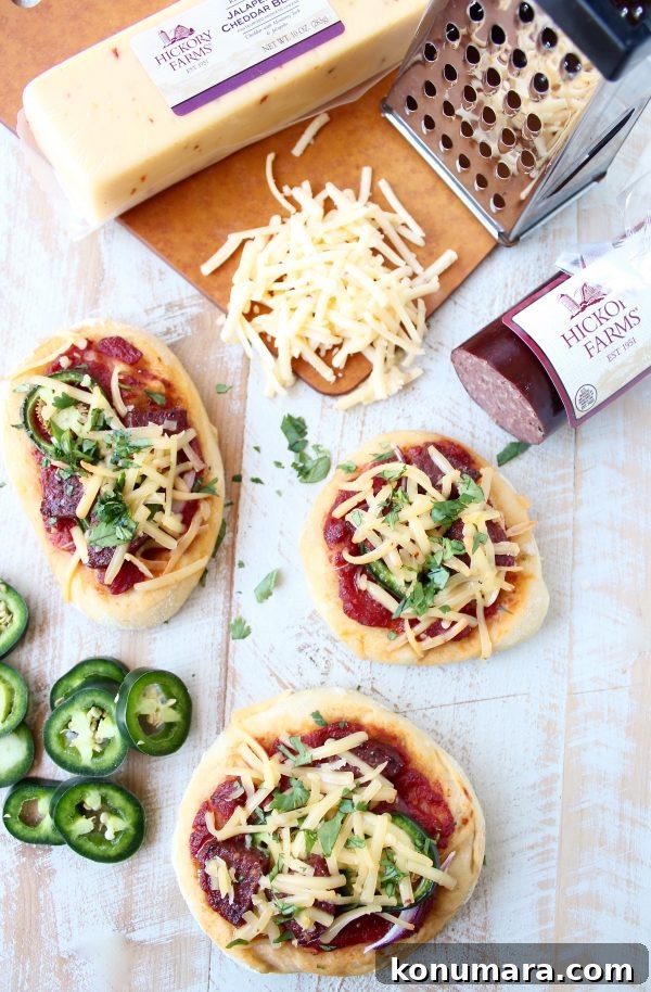 Spicy Sausage Mini Pizzas Recipe for Party Appetizers 4 Mini Spicy Sriracha Pizzas