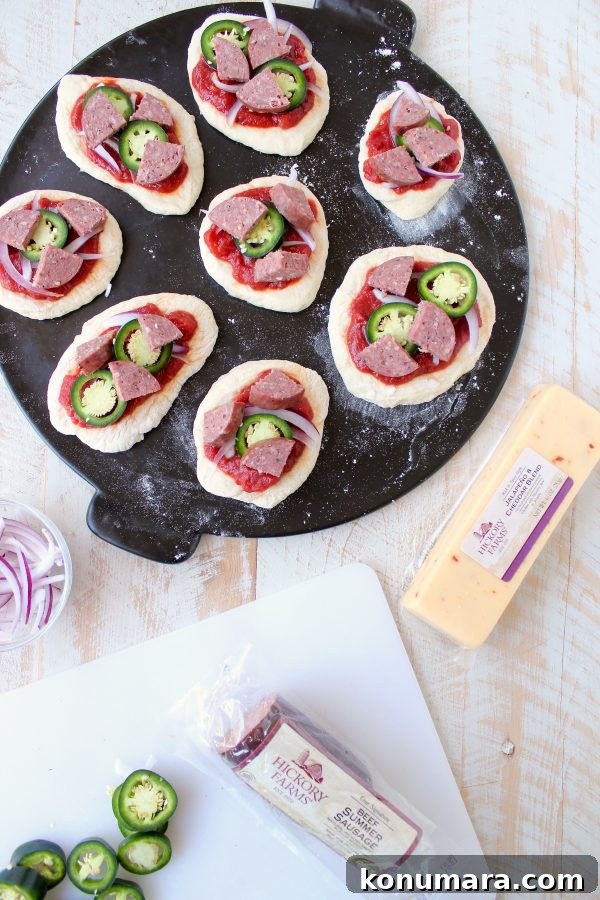 Spicy Sausage Mini Pizzas Recipe for Party Appetizers 5 Mini Spicy Sriracha Pizzas