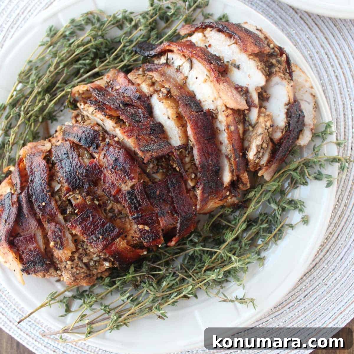 15 Thanksgiving Recipes to Impress Your Holiday Guests 3 Bacon Wrapped Turkey Breast