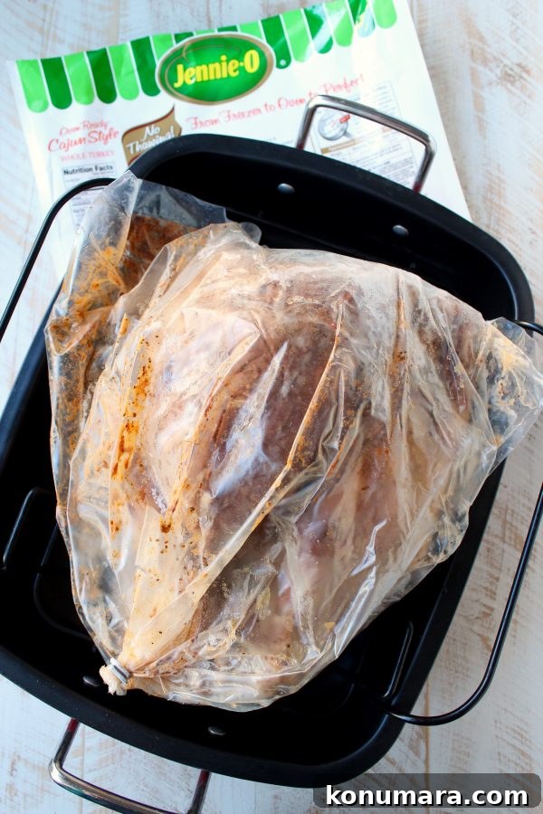 Oven-Roasted Cajun Turkey with Creamy Cajun Mashed Potatoes 4 Turkey roasting in the oven
