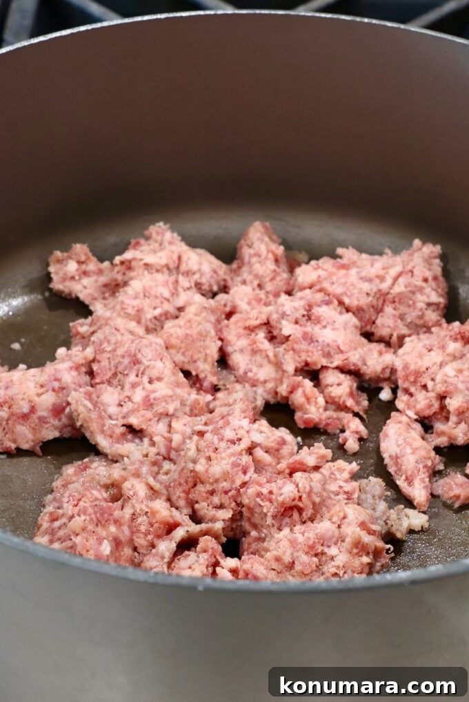 Savory Sausage Stuffing Recipe with Herbs 4 crumbled sausage in a large pan