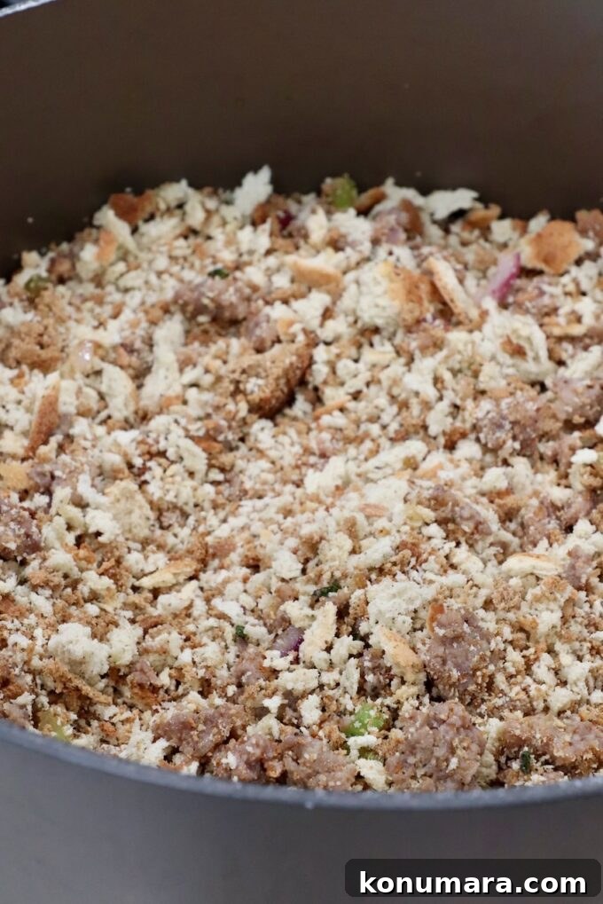 Savory Sausage Stuffing Recipe with Herbs 7 crumbled sausage and dried stuffing bread crumbs in a large pot