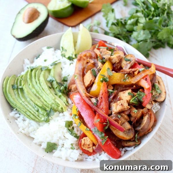 Turkey fajita rice bowl with peppers and avocado