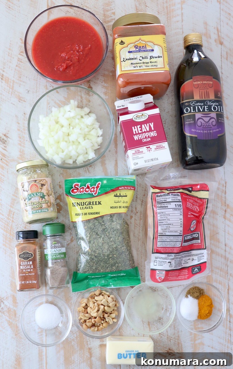 Authentic Indian Butter Chicken Recipe, Creamy and Rich 3 ingredients for Indian butter chicken on white wood board