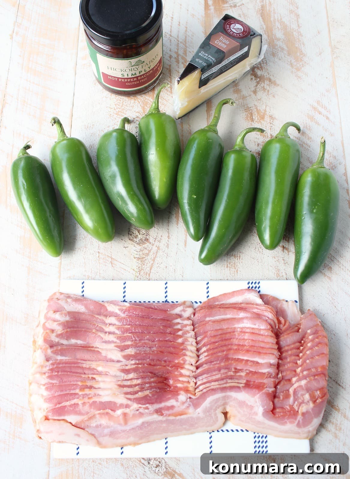 Bacon jam and triple crème cheese fill fresh jalapeños in this delicious and easy jalapeño poppers recipe, perfect for a dinner or party appetizer!