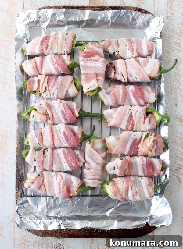 Bacon jam and triple crème cheese fill fresh jalapeños in this delicious and easy jalapeño poppers recipe, perfect for a dinner or party appetizer!