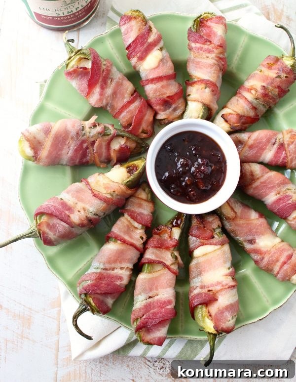 Bacon jam and triple crème cheese fill fresh jalapeños in this delicious and easy jalapeño poppers recipe, perfect for a dinner or party appetizer!