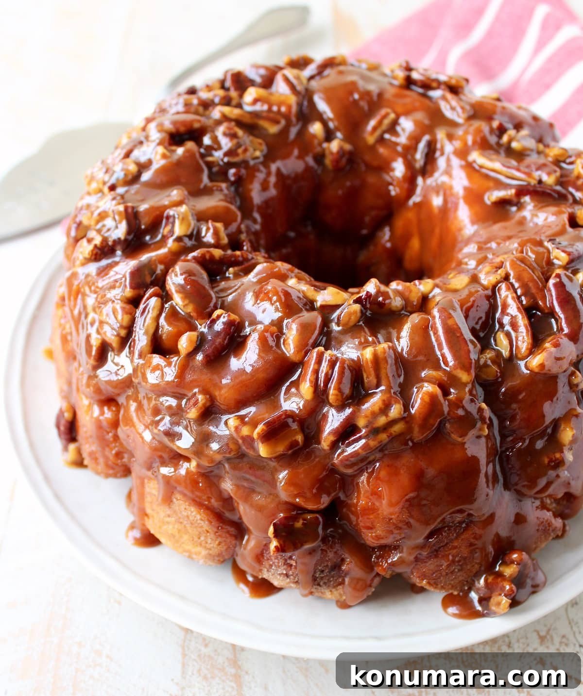 Salted caramel and pecans are added to this easy Monkey Bread Recipe that makes the most decadent, melt-in-your-mouth breakfast or brunch!