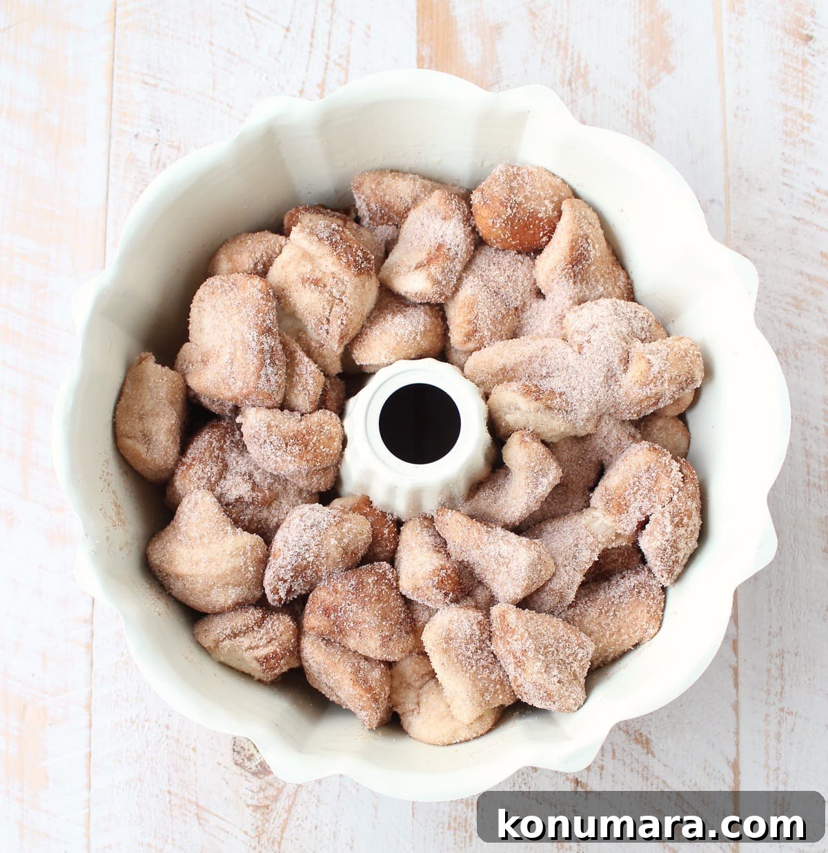 Salted caramel and pecans are added to this easy Monkey Bread Recipe that makes the most decadent, melt-in-your-mouth breakfast or brunch!