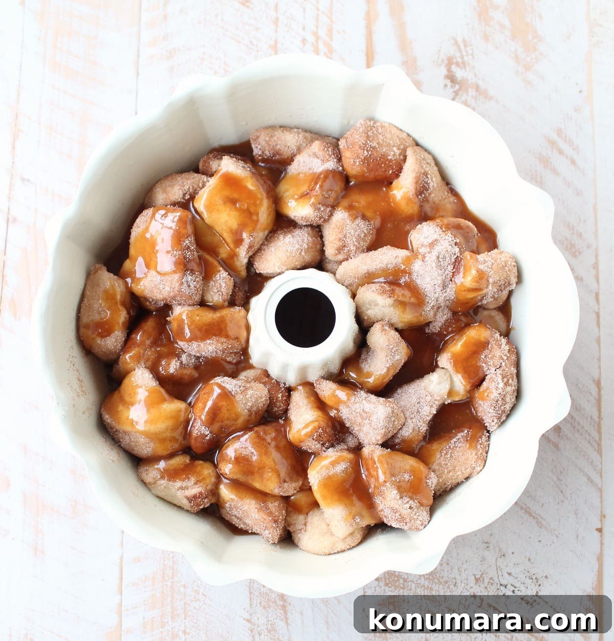 Salted caramel and pecans are added to this easy Monkey Bread Recipe that makes the most decadent, melt-in-your-mouth breakfast or brunch!