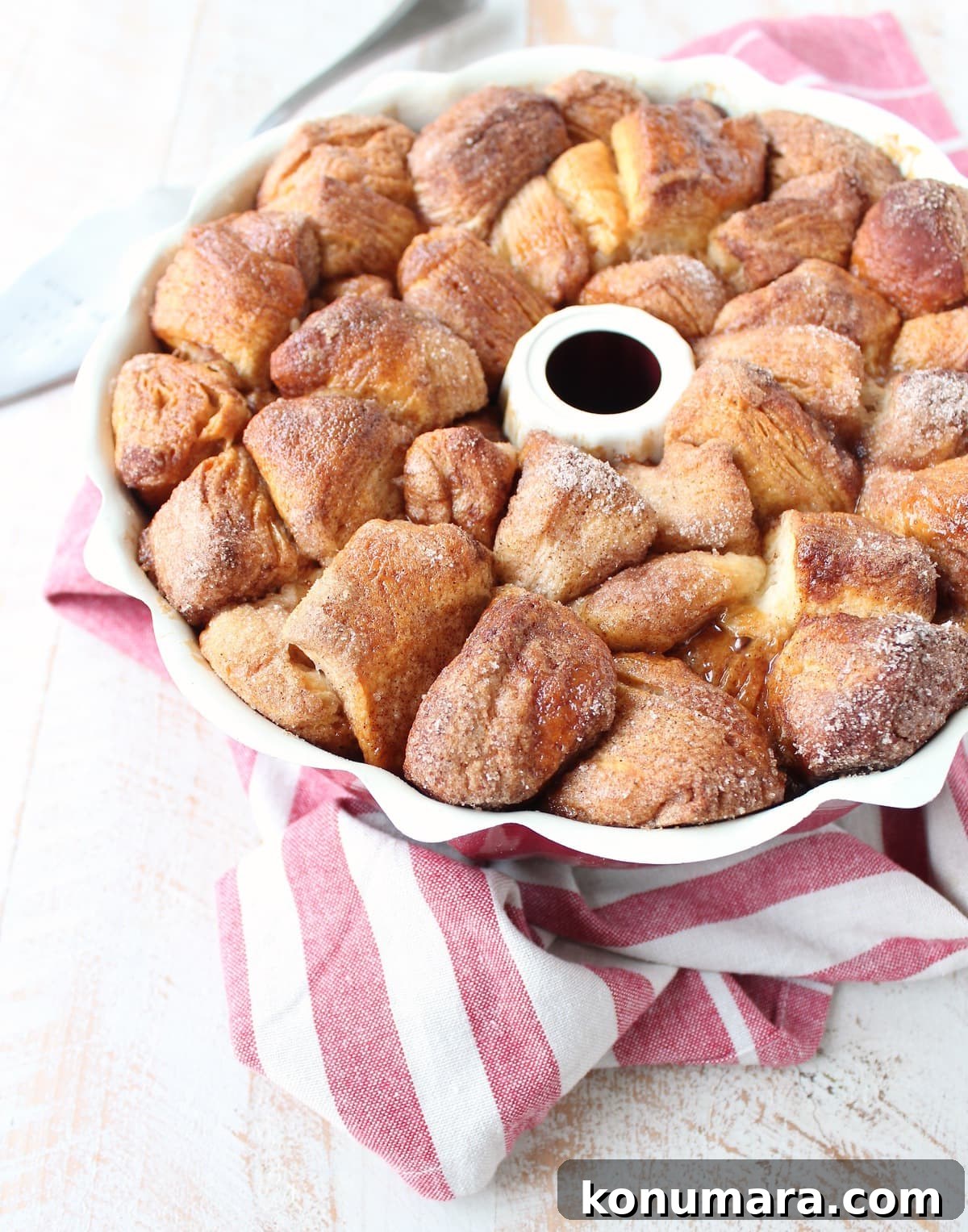 Salted caramel and pecans are added to this easy Monkey Bread Recipe that makes the most decadent, melt-in-your-mouth breakfast or brunch!