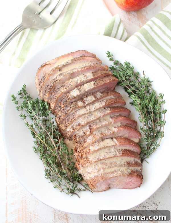 Chipotle Apple-Glazed Pork Loin Recipe 6 A boneless pork loin is cooked in a delicious combination of chipotle, nutmeg, cloves, maple syrup & apple juice in a sous vide or slow cooker.