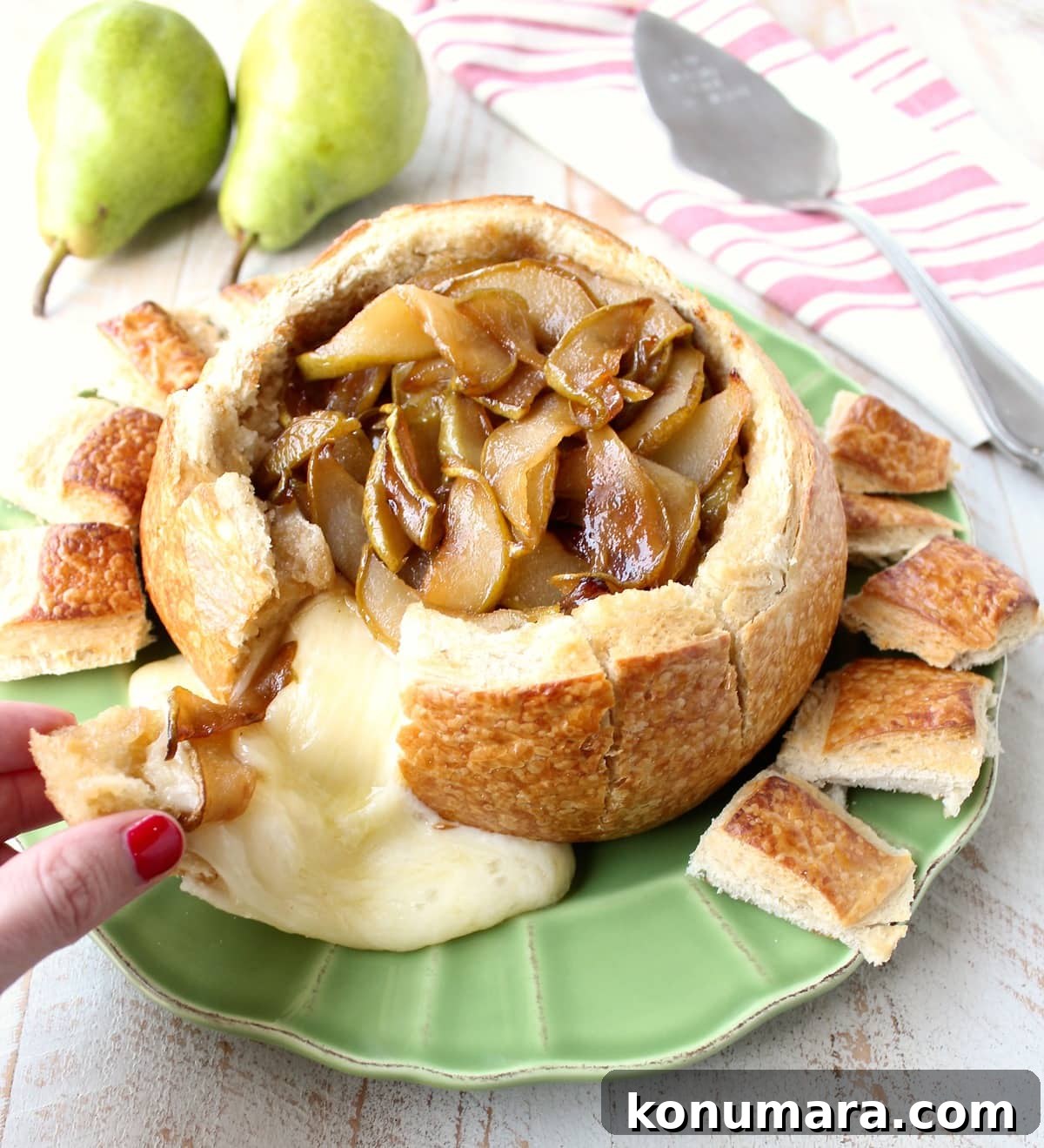 Caramelized Pear Baked Brie Bread Bowl with Fresh Pears and Toasted Pieces of Sourdough Bread