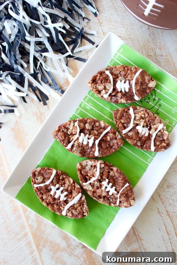 No-Bake Nutella Rice Krispie Football Treats 2 Nutella Rice Krispie Treats are a deliciously easy dessert, make them football shaped for game day parties or Superbowl Sunday!