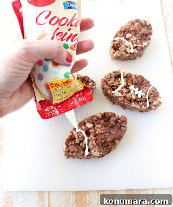 No-Bake Nutella Rice Krispie Football Treats 8 Nutella Rice Krispie Treats in a stack