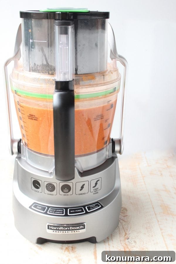 pureed tomato soup in a food processor