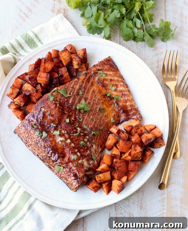 Smoky Cinnamon Chipotle Salmon Recipe 2 Baked Cinnamon Chipotle Salmon: sweet and spicy glazed salmon roasted with sweet potatoes