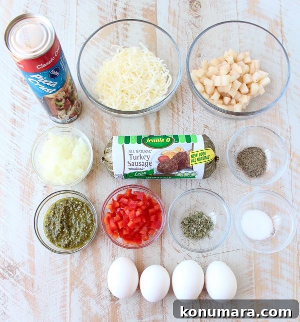 Sheet-Pan Breakfast Pizza Recipe with Eggs and Bacon 5 Finished breakfast pizza on a cutting board topped with fresh basil