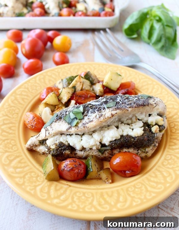 Sheet Pan Stuffed Chicken with Goat Cheese and Pesto 10 Plated stuffed sheet pan chicken with basil and parmesan