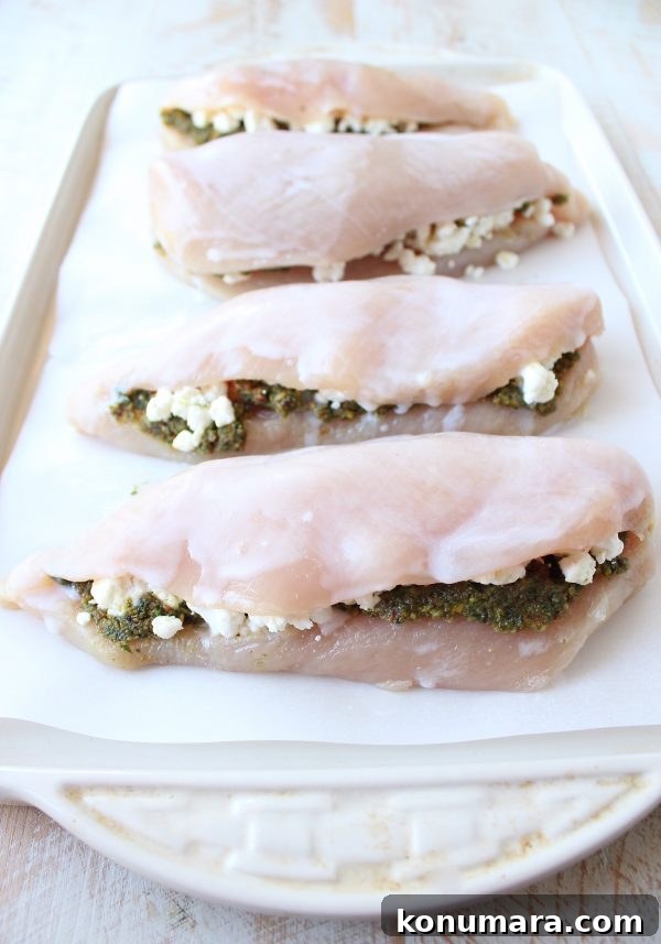 Sheet Pan Stuffed Chicken with Goat Cheese and Pesto 5 Chicken breasts stuffed with pesto and goat cheese