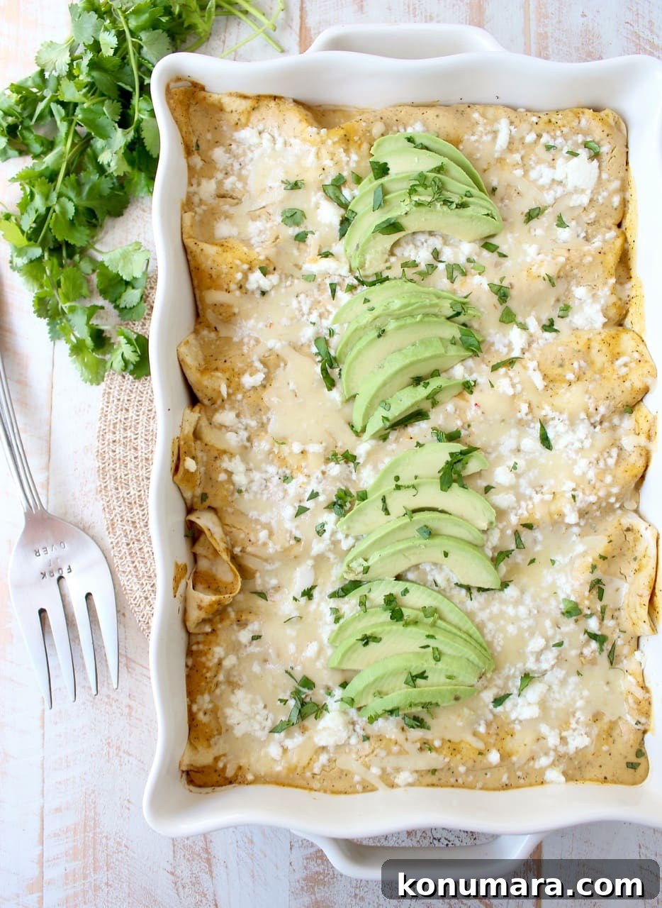 Vegetarian Cheesy Avocado and Corn Enchiladas Recipe 7 The best vegetarian enchiladas ever combine two cheeses, corn & deliciously creamy avocado sauce for a mouth watering meatless Mexican recipe!