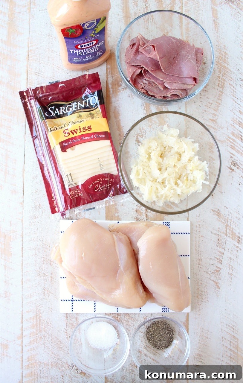 Reuben chicken is tossed with thousand island dressing, stuffed with sauerkraut & corned beef & topped with swiss cheese for a tasty, easy dinner recipe!