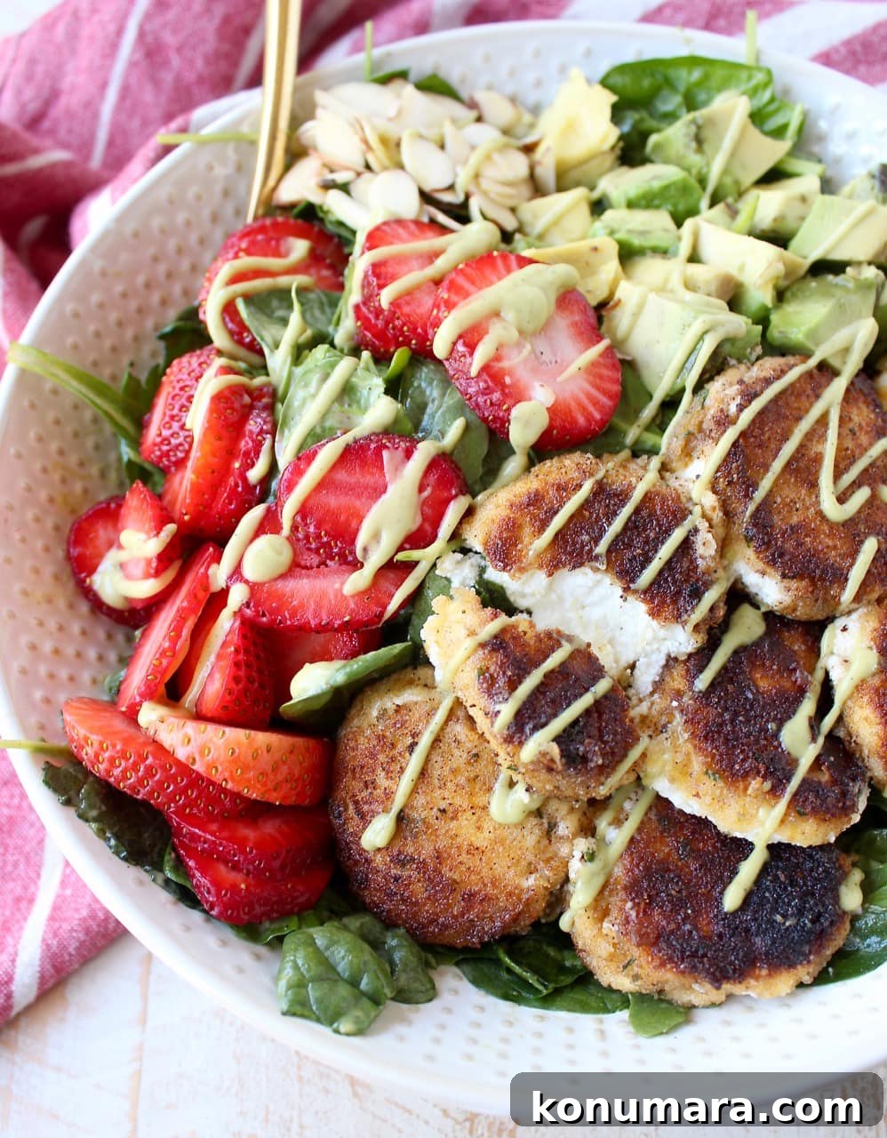 Strawberry Avocado Salad with Crispy Goat Cheese 2 Crispy goat cheese, creamy avocado & juicy strawberries top spinach & arugula, tossed with avocado vinaigrette, for the perfect vegetarian Spring salad!