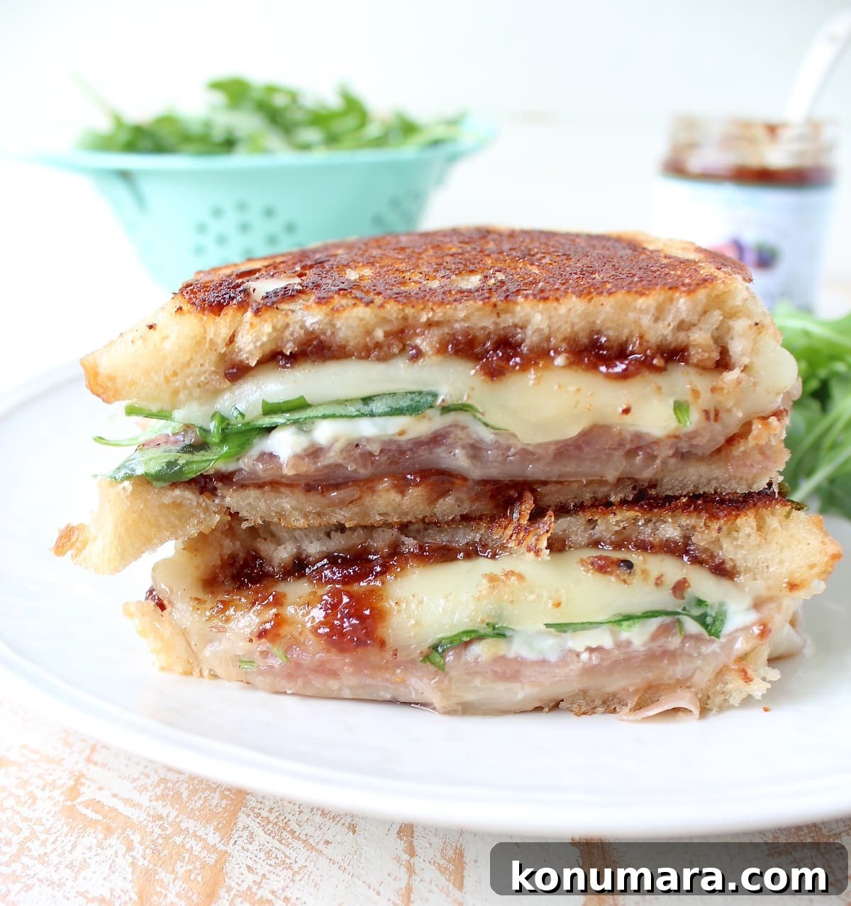 Fig and Prosciutto Grilled Cheese with Provolone 6 Close up of melty provolone in grilled cheese with fig and prosciutto