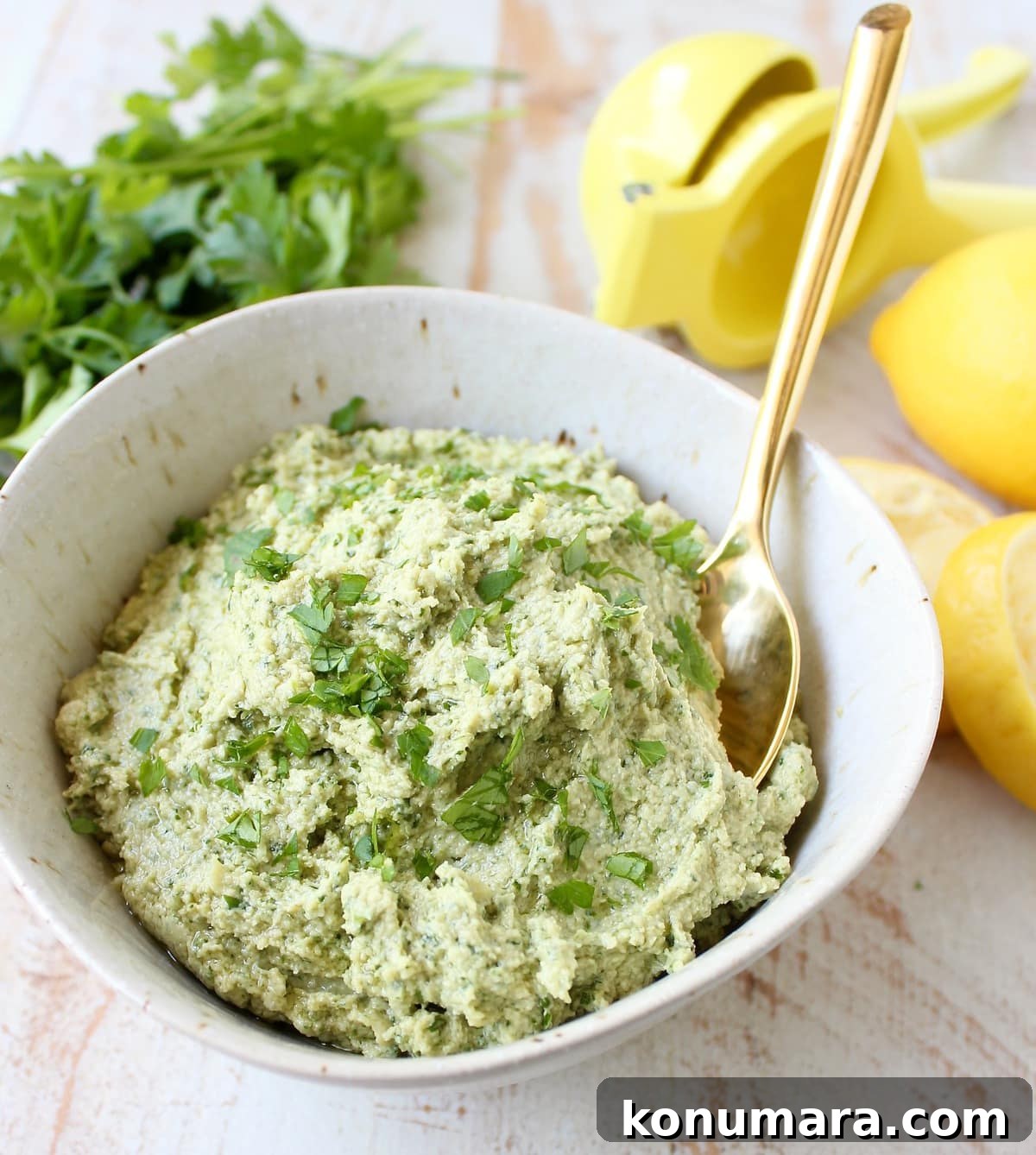 Green tahini sauce served with vegetables