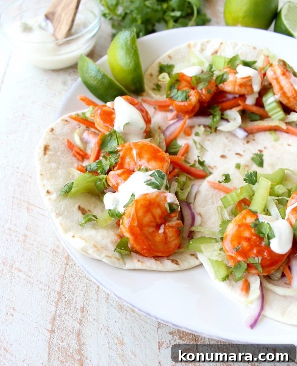 Buffalo Shrimp Tacos are an easy weeknight meal, made in just 15 minutes! They're also perfect for celebrating Taco Tuesday or Cinco De Mayo!