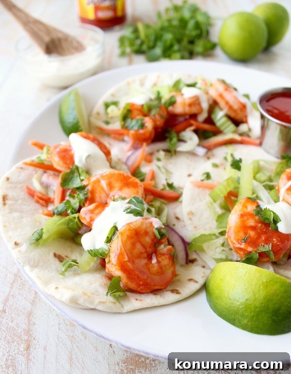 Buffalo Shrimp Tacos are an easy weeknight meal, made in just 15 minutes! They're also perfect for celebrating Taco Tuesday or Cinco De Mayo!