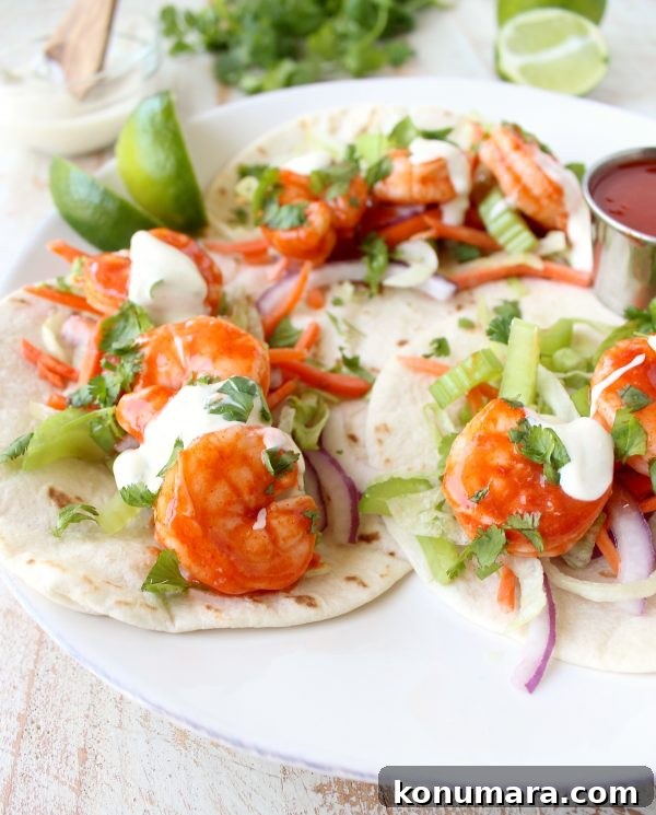 Buffalo Shrimp Tacos are an easy weeknight meal, made in just 15 minutes! They're also perfect for celebrating Taco Tuesday or Cinco De Mayo!