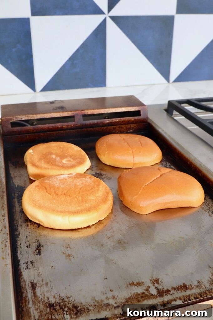 hamburger buns on griddle