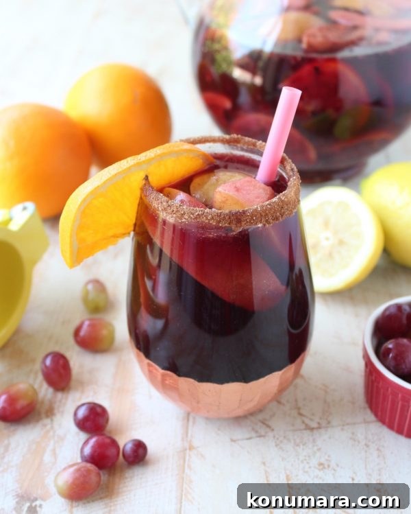 Smoky Grilled Fruit Sangria Recipe for Summer 2 Red Wine Sangria with cinnamon sugar grilled peaches, apples, oranges and lemons