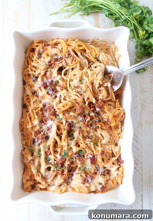 BBQ Chicken and Bacon Baked Spaghetti 6 Cheesy BBQ baked spaghetti with shredded chicken and bacon